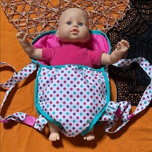 Baby doll with carrier.